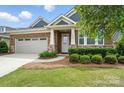 Charming front exterior featuring well-kept landscaping and a welcoming entryway at 3029 Marchers Trace Dr, Charlotte, NC 28227
