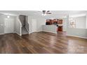 Spacious living room featuring sleek wood floors, neutral paint, and stairs to the upper level at 329 Brannon Meadows Dr, York, SC 29745