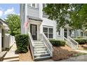 A beautifully landscaped front yard leads to the charming entrance of a well-maintained home at 432 W Worthington Ave, Charlotte, NC 28203