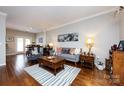 Inviting living room with hardwood floors, stylish furnishings, and an open layout ideal for relaxation and entertainment at 432 W Worthington Ave, Charlotte, NC 28203