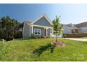 Beautifully landscaped home showcases lush green lawn and a charming exterior at 5244 Admirals Lndg, Lancaster, SC 29720