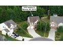 Aerial view of a home on a cul-de-sac with approximate parcel lines and mature trees at 1210 Tabitha Ct, Monroe, NC 28110