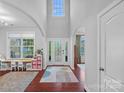 Welcoming foyer with high ceilings, decorative rug, and natural light at 1335 Bryson Gap Dr, Fort Mill, SC 29715