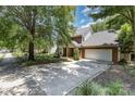 A well-maintained two-story home with brick accents, a two car garage, and a spacious driveway at 2001 Enderbury Dr, Indian Trail, NC 28079
