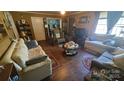 Cozy living room features hardwood floors, comfortable seating, and decorative accents, creating a welcoming atmosphere at 3418 York Hwy, Gastonia, NC 28052