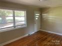 Bright living room featuring hardwood floors and large window at 3484 S Hwy 127 Hwy, Hickory, NC 28602