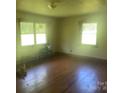 Bright living room with hardwood floors and ample natural light at 10010 Stokes Ferry Rd, Gold Hill, NC 28071