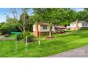 Picture of a well-kept home on a spacious lot, boasting mature trees and a cozy, welcoming atmosphere at 103 Little Forest Ln, Statesville, NC 28625