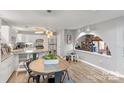 Bright and airy kitchen features white cabinets, granite countertops, and stainless steel appliances at 1420 11Th Street Nw Dr # 15, Hickory, NC 28601