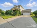 Spacious driveway leading to a well-maintained home with a two-car garage at 3007 Arsdale Rd, Waxhaw, NC 28173