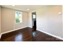 Open-concept dining room features hardwood floors and abundant natural light at 419 Lige St, Rock Hill, SC 29730