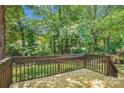 Beautiful backyard deck with views of the lush landscape at 7217 Rena Mae Ln, Charlotte, NC 28227