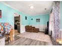 Cozy living room with wood floors and doorway views to the kitchen at 920 Manor Dr, Kings Mountain, NC 28086