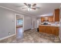 Spacious kitchen features wood cabinets, linoleum flooring, and an open layout, ideal for Gathering meals at 1132 Arbor Dr, Salisbury, NC 28144