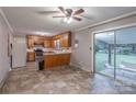 Functional kitchen featuring wood cabinets, linoleum flooring and an open layout, great for casual dining at 1132 Arbor Dr, Salisbury, NC 28144