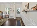 Inviting foyer with stylish decor, hardwood floors, and plenty of natural light at 159 Autumn Mist Rd, Statesville, NC 28677