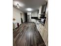 Bright kitchen features modern appliances, ample cabinetry, and stylish flooring at 3375 Shepherd Rd, Maiden, NC 28650