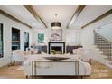 Bright living room features hard wood floors, a fireplace, and an open floor plan at 705 Mcalway Rd, Charlotte, NC 28211