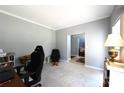 Office with gray walls and carpet, featuring a desk and chair at 219 Harrowfield Hts, York, SC 29745