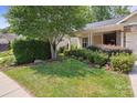 Well-manicured front yard with lush green grass and landscaping, enhancing curb appeal at 5524 Elk Knob Ct, Denver, NC 28037