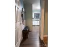 Inviting entryway with convenient storage bench and view into updated kitchen at 605 Impala Dr, Albemarle, NC 28001