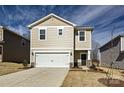 Charming two-story home featuring a two-car garage and well-maintained front lawn at 1402 31St Ne St, Conover, NC 28613