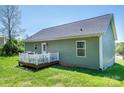 Well-maintained backyard with a deck and a view of the siding of the house at 50 Serenity Ln, Hickory, NC 28601