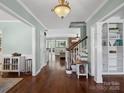 Spacious foyer with hardwood floors and decorative columns, perfect for welcoming guests at 165 Cottontail Se Ln, Concord, NC 28025