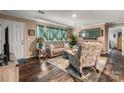 Inviting living room features stylish decor, comfortable seating, and wood-look floors at 200 Vista Pointe Dr, Stony Point, NC 28678