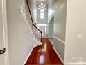 Grand foyer with hardwood floors, staircase and high ceilings, showcasing natural light at 2609 Lamp Post Ln, Kannapolis, NC 28081