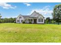 Charming single-Gathering home with a well-manicured lawn and inviting front porch at 3624 Ramsey Rd, Sharon, SC 29742