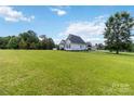 View of the home's large yard and fenced perimeter, perfect for outdoor enjoyment at 3624 Ramsey Rd, Sharon, SC 29742