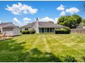 Large, well-manicured backyard featuring a shed and a charming view at 3720 Winterberry Nw Ct, Concord, NC 28027