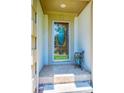 Charming front entry featuring a decorative glass door and tiled porch at 3889 Mattingly Dr, Hickory, NC 28602