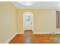 Inviting entryway with hardwood floors, neutral walls, and a classic white front door at 4555 Us 601 Hwy, Salisbury, NC 28147