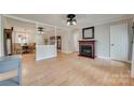 Open concept living room with beautiful hardwood floors and fireplace at 1498 Legion Rd, Fort Mill, SC 29715