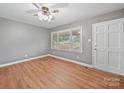 Well-lit living room boasts sleek flooring and neutral wall paint at 197 Horseshoe Loop, Statesville, NC 28625