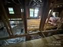 Exposed interior showing the frame work and structure, revealing construction at 310 E Division Ave, East Spencer, NC 28039