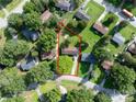 Aerial shot of home showcasing its location within a neighborhood with mature trees at 517 Fieldcrest Dr, Chester, SC 29706