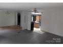 View of the home's open floor plan from the living room to the kitchen area at 5324 Weblee Ct, Kings Mountain, NC 28086