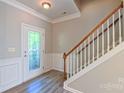 Inviting foyer with a staircase and decorative front door at 11514 Hattie Little St, Charlotte, NC 28269