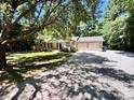 Lovely home featuring a two-car garage, a paved driveway, and manicured lawn at 124 Julius Ln, Mooresville, NC 28117