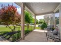 Cozy front porch with comfortable seating, perfect for relaxing and enjoying the outdoors at 1805 Trading Path Ln, Waxhaw, NC 28173