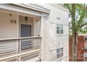 Entrance to Unit 558 featuring a private balcony and modern design at 558 Oakland Ave, Charlotte, NC 28204