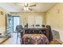 Inviting dining area with hardwood floors and a large window that creates a warm and welcoming atmosphere at 1713 Poe Cir, Hickory, NC 28601