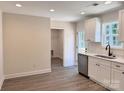 Stylish kitchen featuring stainless steel appliances, white cabinets, and bright eating area at 2063 Highwood Rd, Rock Hill, SC 29732