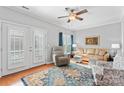 Bright living room with hardwood floors, neutral walls, and comfortable seating at 4103 Christine Ln # E, Waxhaw, NC 28173
