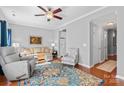 Comfortable living room with hardwood floors, neutral paint, and ample seating at 4103 Christine Ln # E, Waxhaw, NC 28173