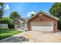 Lovely single-story home boasting a brick-accented facade and a two-car garage at 4507 Mackinac St, Charlotte, NC 28269