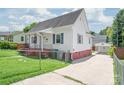 Cozy home with well maintained lawn, convenient driveway, and lovely exterior, awaiting your personal touch at 1113 W 4Th Ave, Gastonia, NC 28052